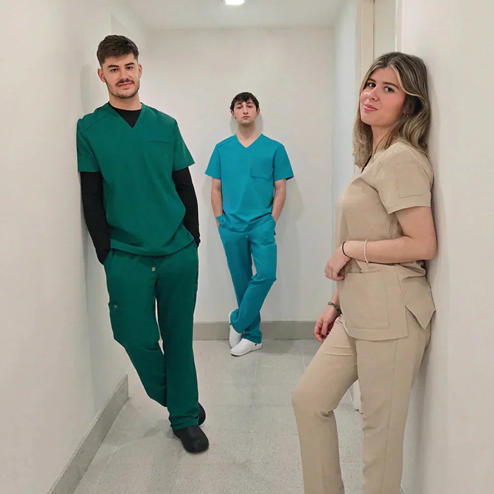 Group of laboratory technicians wearing professional medical scrubs