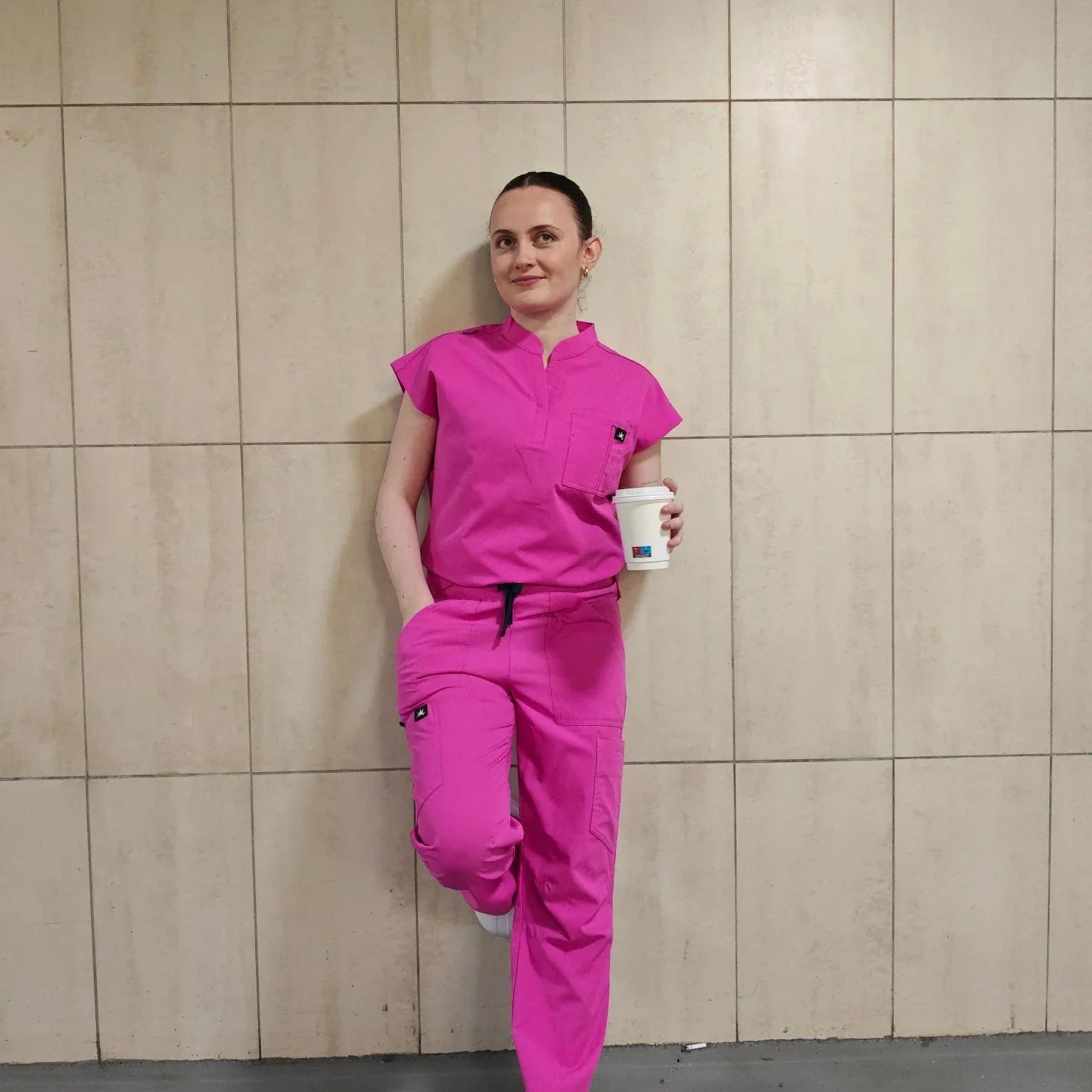 Comfortable podiatry scrubs designed for podiatrists performing foot care treatments