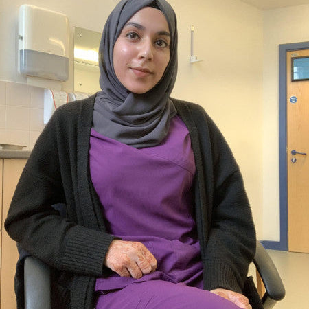 Women wearing purple medical scrub