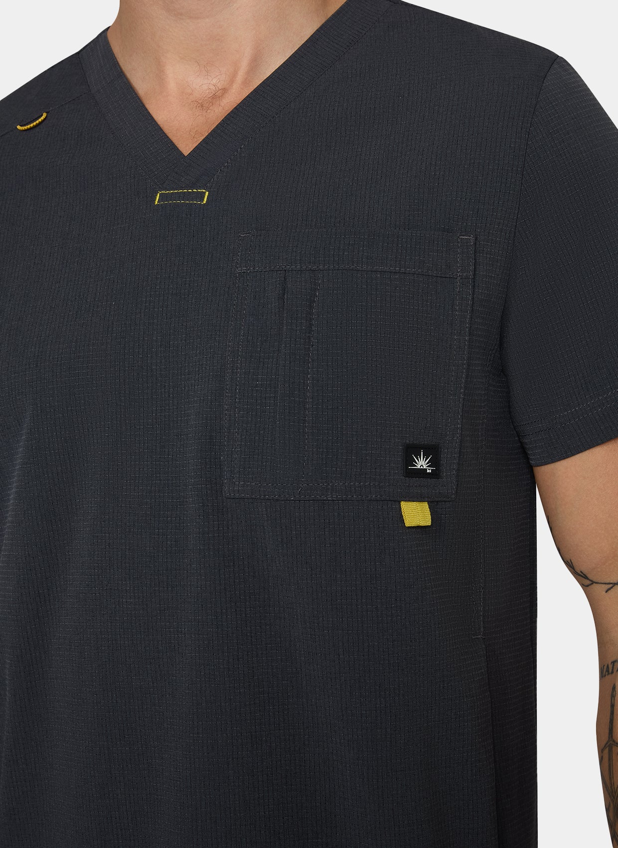 Men's Koi Solis Caldwell scrub top charcoal closeup