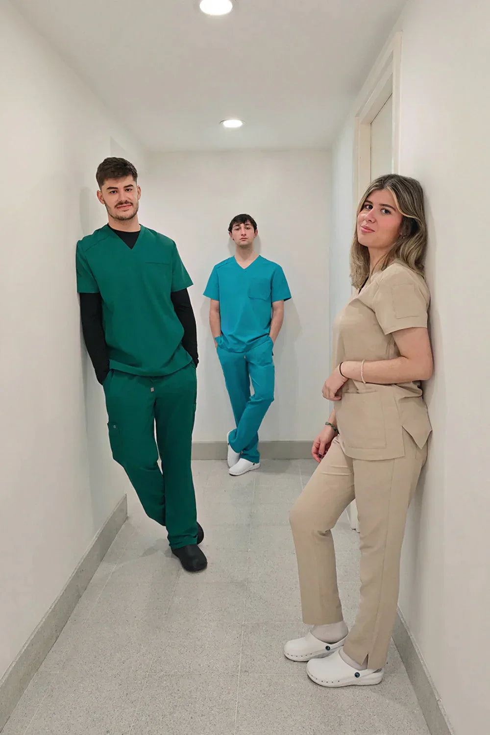 Group of laboratory technicians wearing professional medical scrubs