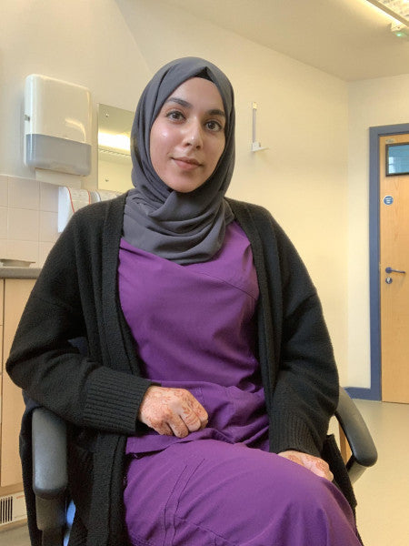 Women wearing purple medical scrub
