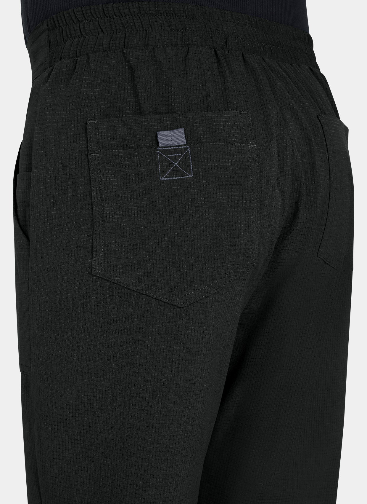Men's Koi Solis black scrub trousers closeup
