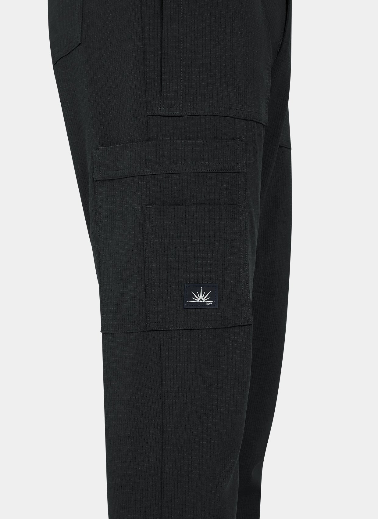 Men's Koi Solis black scrub trousers closeup
