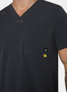 Men's Koi Solis Caldwell scrub top charcoal closeup