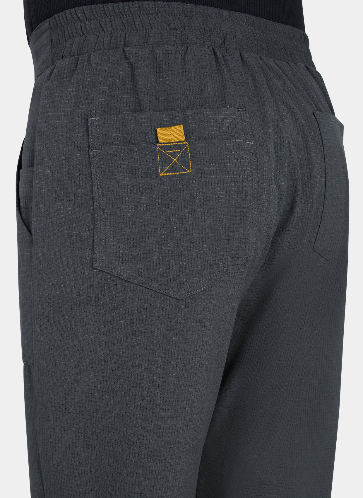 Men's Koi Solis scrub trousers charcoal closeup
