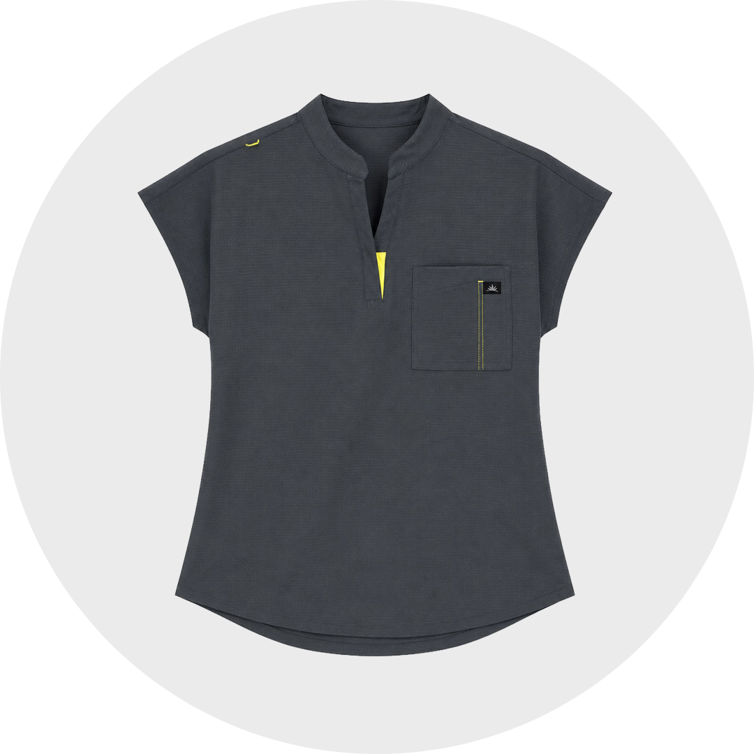 Dark charcoal-gray short-sleeve beauty tunics top with a stand collar, V-neck zip opening accented in bright yellow, and a chest pocket with subtle yellow detailing.