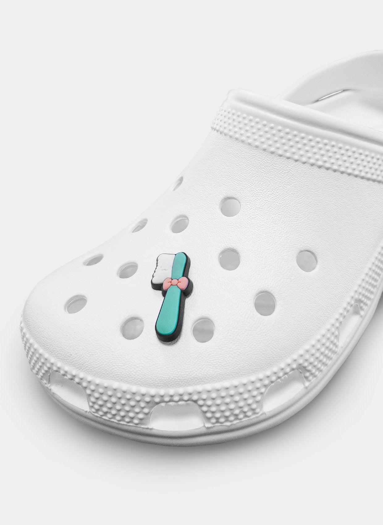 clog charm dental teal cavity crusher brush 