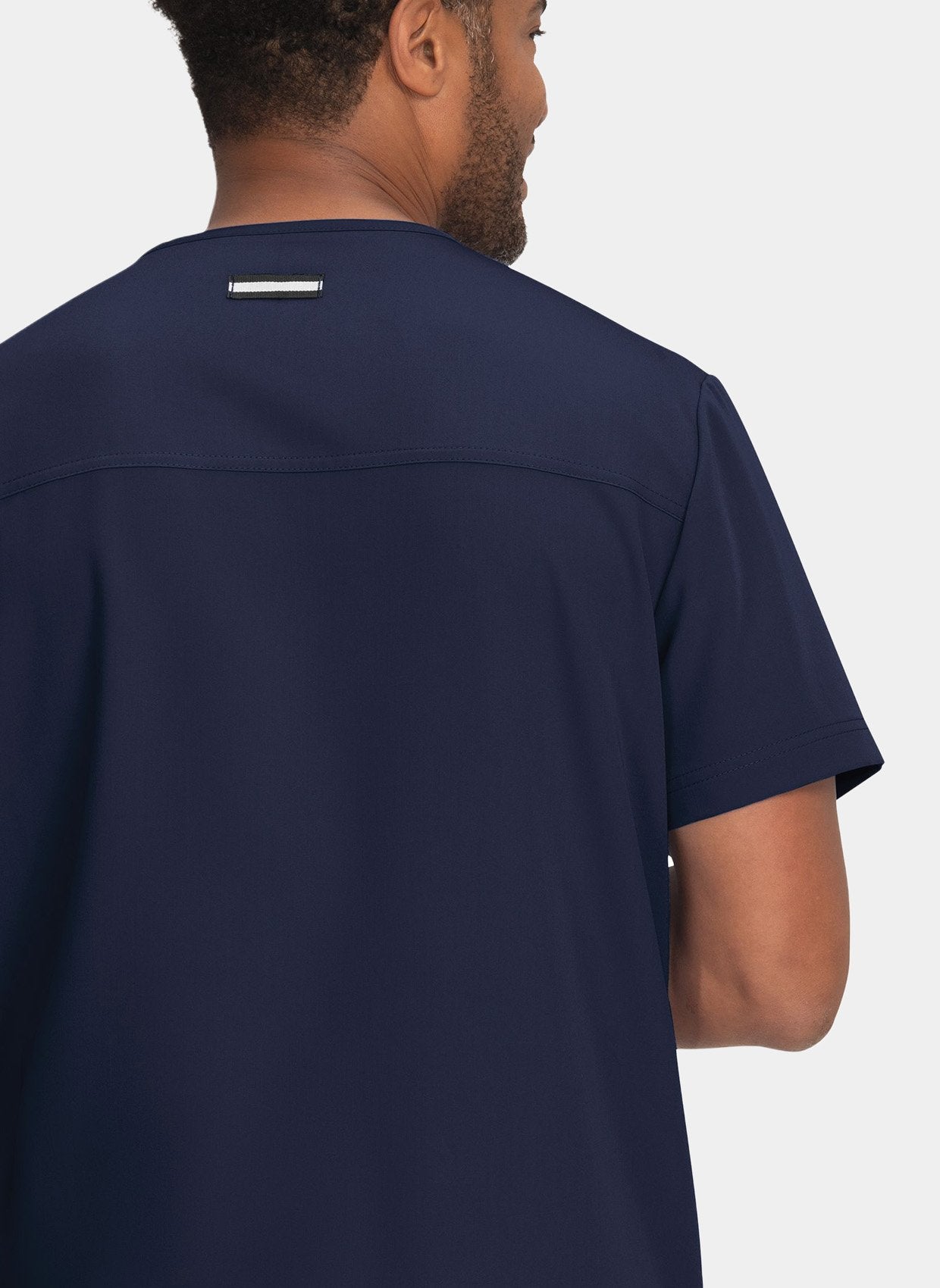 mens-koi-next-gen-free-to-be-scrub-top-front-navy-1