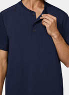 Koi Next Gen Flex Forward men's navy scrub top with short sleeves and a button collar