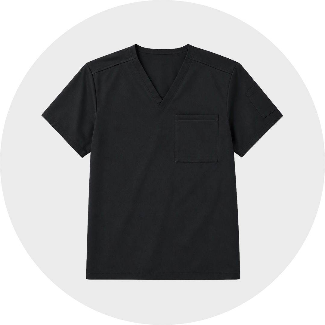 Black short-sleeve plus size V-neck scrub top with a chest pocket, shown against a light gray circular background.